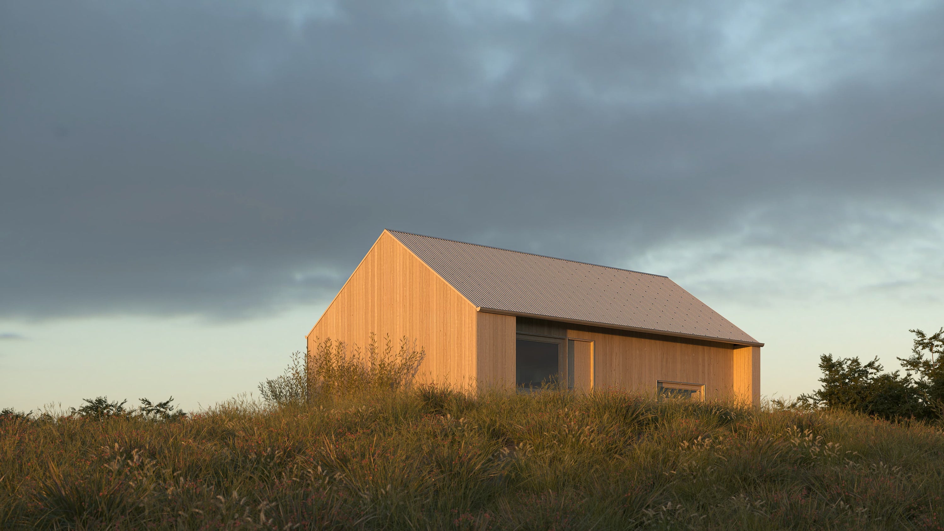 Wooden cabin in a field under a dark, stormy sky