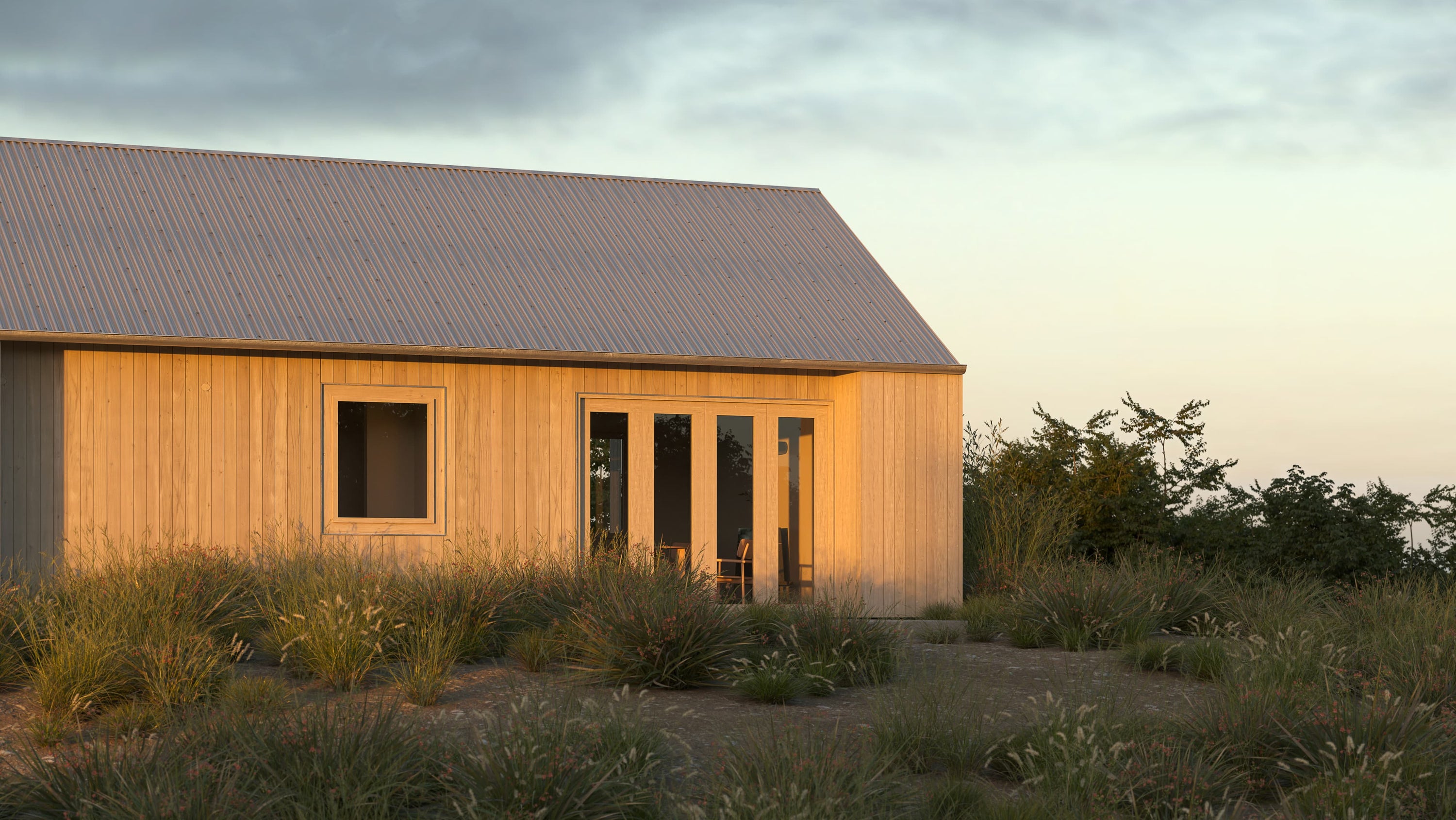Modern wooden house in a rural setting with a cloudy sky