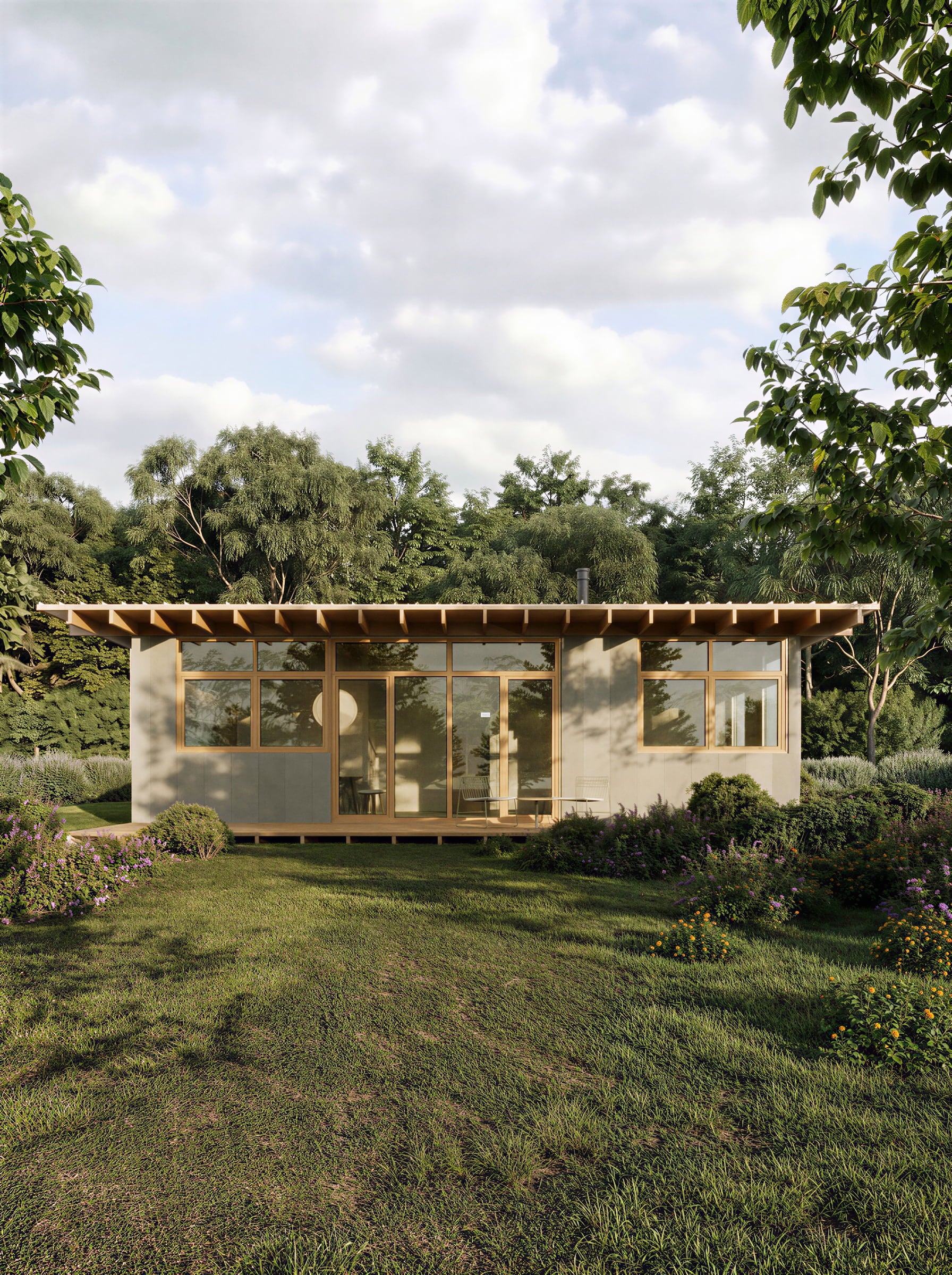 Modern house with glass walls in a green, natural setting